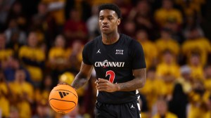 Cincinnati Bearcats guard Jizzle James (2) against the Arizona State Sun Devils at Desert Financial Arena.