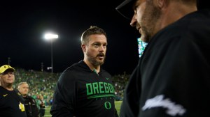 Sep 18, 2026; Eugene, Oregon, USA; Oregon Ducks head coach Dan Lanning shakes the hand of Portland State Vikings head coach Chris Fisk after a game at Autzen Stadium.