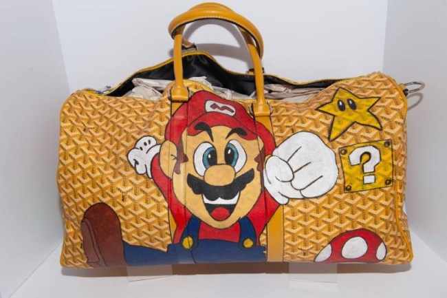  Custom Hand-Painted and Signed Super Mario Duffel Bag from former NBA player Mike Muscala's estate sale