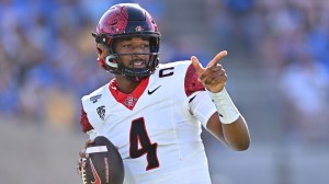 Sep 12, 2026; Pasadena, California, USA; San Diego State quarterback Jayden Denegal (4) gestures during the first half against UCLA at the Rose Bowl.