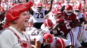 Arkansas football crowd attendance fans fire hunter yuracheck tailgate empty