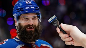 Avalanche defenseman Brent Burns next to hand holding a razor