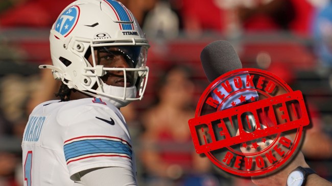 Titans QB Cam Ward next to revoked reporter's microphone