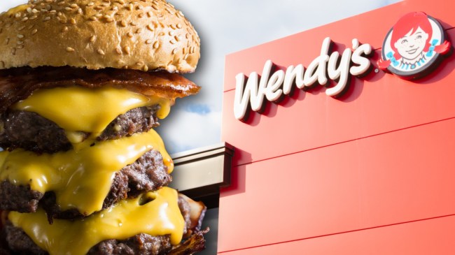 Triple cheeseburger next to logo at Wendy's restaurant