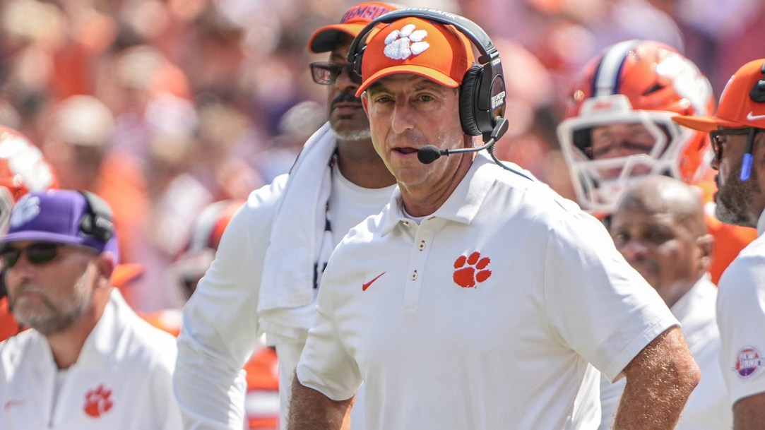 Clemson boo dabo swinney fired north carolina spike football fans crowd leave