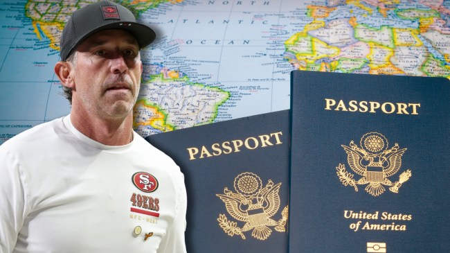49ers coach Kyle Shanahan next to United States passports on world map