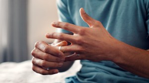 man-removing-wedding-ring