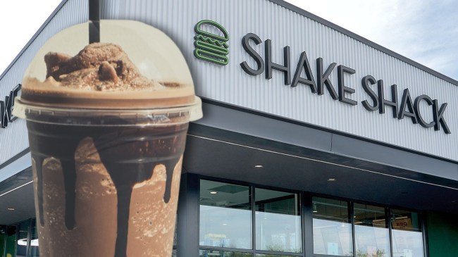 chocolate milkshake next to Shake Shack restaurant