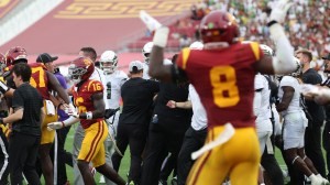 Oregon USC dante moore hit reaction fight brawl coach penalty accost players