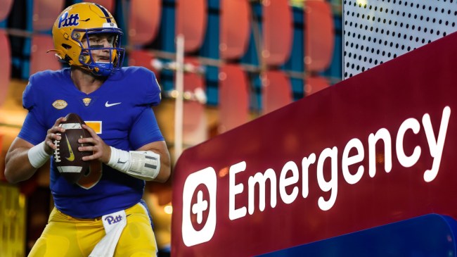 Pitt QB Phil Jurkovec at next to emergency room sign outside a hospital