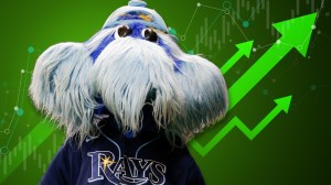 Tampa Bay Rays mascot next to green arrow