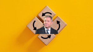 NFL analyst Troy Aikman inside a collection of arrows