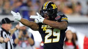 Missouri Tigers running back Ahmad Hardy (29) reacts to his first down pickup during the first quarter of the TaxSlayer Gator Bowl at EverBank Stadium, Saturday, Dec. 27, 2025, in Jacksonville. Fla.