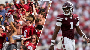 Alabama Crimson Tide fans cheer during the second half against the Mississippi State Bulldogs at Davis Wade Stadium at Scott Field. Mississippi State Bulldogs quarterback Kamario Taylor (1) reacts during the second quarter against the Alabama Crimson Tide at Davis Wade Stadium at Scott Field.