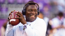 Former Miami Hurricanes Star Warren Sapp Appears To Kick FSU Fan During Tailgate Dispute Over Umbrella