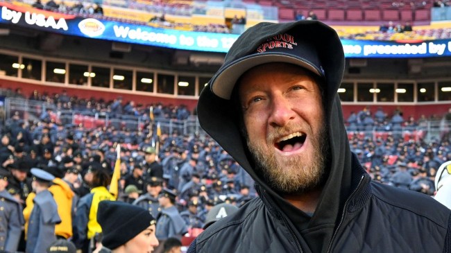 Dec 14, 2024; Landover, Maryland, USA; Dave Portnoy, Bar Stool Sports founder and owner walks along the sidelines before the playing of the 125 Army Navy game at Commanders Field. Mandatory Credit: Tommy Gilligan-Imagn ImagesDec 14, 2024; Landover, Maryland, USA; Dave Portnoy poses with solders before the between the Army Black Knights and the Navy Midshipmen at Commanders Field.