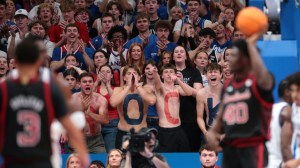 Kansas Jayhawks fans yell after a call on Louisville Cardinals forward Flory Bidunga (40) during the exhibition game inside Allen Fieldhouse in Lawrence, Kansas on Oct. 21, 2026.