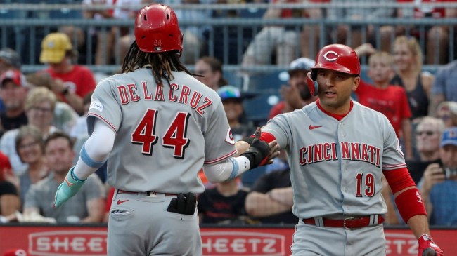 Aug 11, 2023; Pittsburgh, Pennsylvania, USA; Cincinnati Reds first baseman Joey Votto (19) greets shortstop Elly De La Cruz after Cruz scored a run against the Pittsburgh Pirates during the first inning at PNC Park.