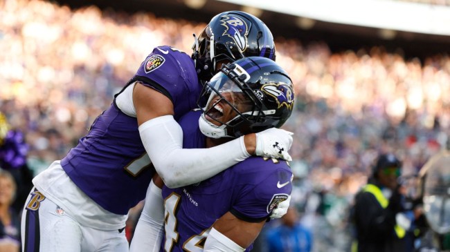 Nov 23, 2025; Baltimore, Maryland, USA; Baltimore Ravens cornerback Marlon Humphrey (44) celebrates with Baltimore Ravens safety Kyle Hamilton (14) after forcing a fumble during the fourth quarter against the New York Jets at M&T Bank Stadium.