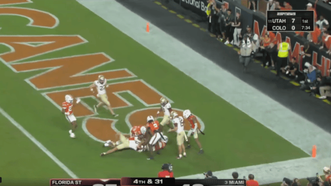 Florida State wide receiver Duce Robinson tries to catch a Hail Mary against Miami on Oct. 17, 2026. 