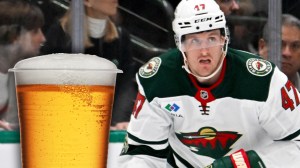 Minnesota Wild forward Michael McCarron next to cup of beer