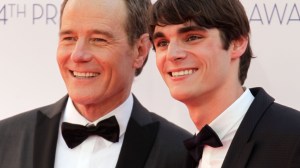 Bryan Cranston posing with RJ Mitte on the red carpet.