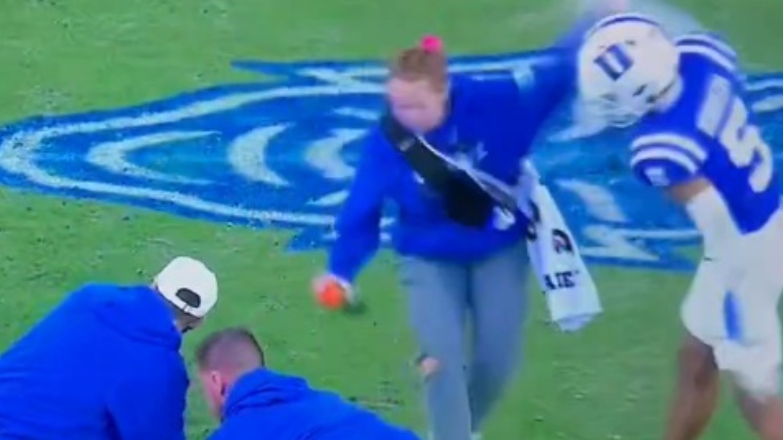 Duke player slaps female staff member.