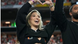 Abella Danger parties with UM Legend on Miami yacht