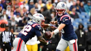 Sep 20, 2026; Foxborough, Massachusetts, USA; New England Patriots quarterback Drake Maye (10) hands teh ball off to running back TreVeyon Henderson (32) during the second half against the Pittsburgh Steelers at Gillette Stadium.
