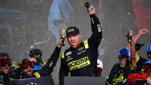 Oct 18, 2026; Avondale, Arizona, USA; 23XI Racing driver Tyler Reddick (45) celebrates his victory of the Freeway Insurance 500 at Phoenix Raceway.