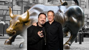 Skateboarding legends Bam Margera and Tony Hawk in front of the Wall Street bull statue