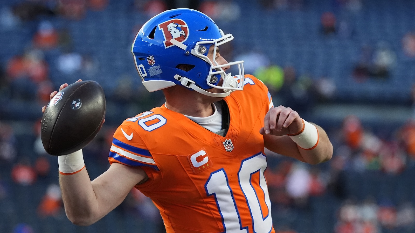 Oct 15, 2026; Denver, Colorado, USA; Denver Broncos quarterback Bo Nix (10) warms up prior to the game against the Seattle Seahawks at Empower Field at Mile High