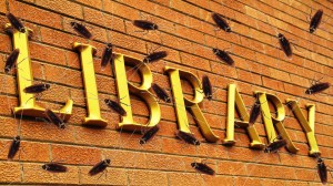 cockroaches over library sign in Toledo, Ohio