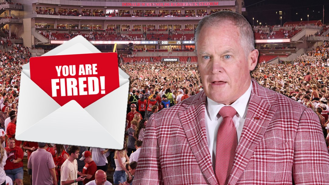 Hunter Yurachek athletic director arkansas fired football fans storm field fine