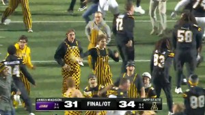 James Madison football player shove App State student field storm pov video
