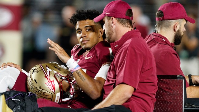 Florida Sate QB Jordan Travis being carted off after injury