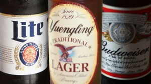 Bottles of Miller Lite, Yuengling, and Budweiser beer
