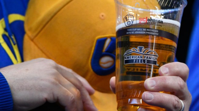 Milwaukee Brewers fan holding a beer
