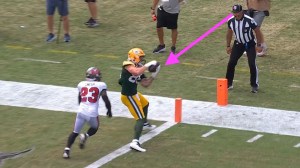 NFL Referee officiating bad call obvious touchdown Tucker Kraft no signal review