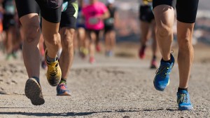 People running a race in the desert