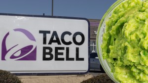 Taco Bell sign next to a bowl of guacamole