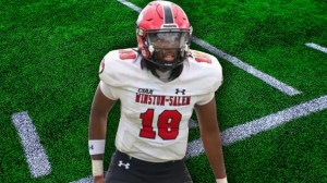 Winston Salem State football player over sidelines