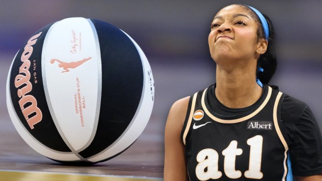 WNBA basketball next to Atlanta Dream center Angel Reese